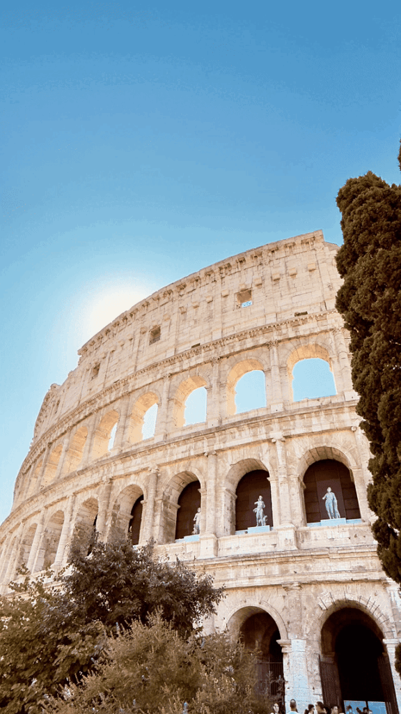 The Colosseum in Rome, Italy, one of the city’s most famous ancient landmarks, featuring its iconic stone arches and multi-level Roman architecture