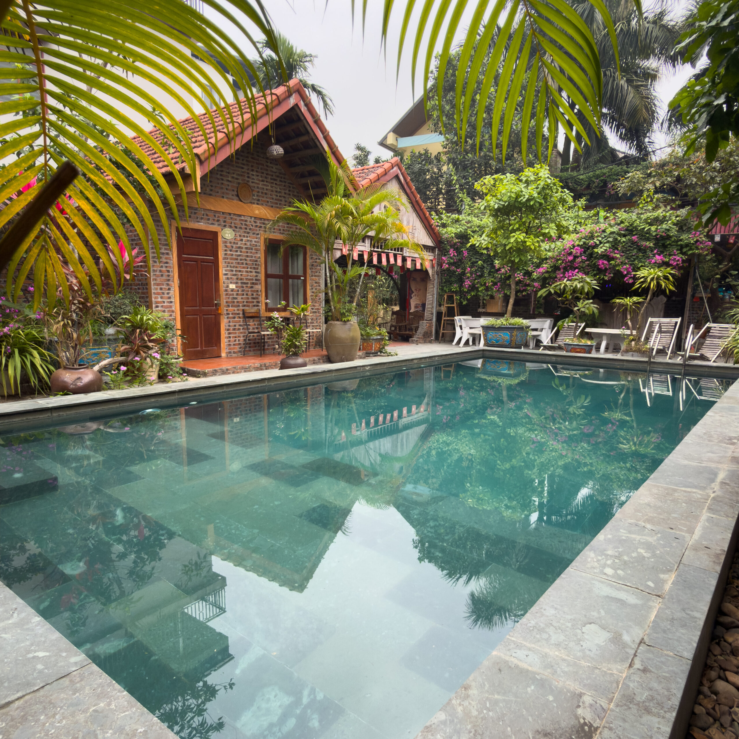 Swimming pool at Tam Coc Tropical Homestay in Ninh Binh, Vietnam