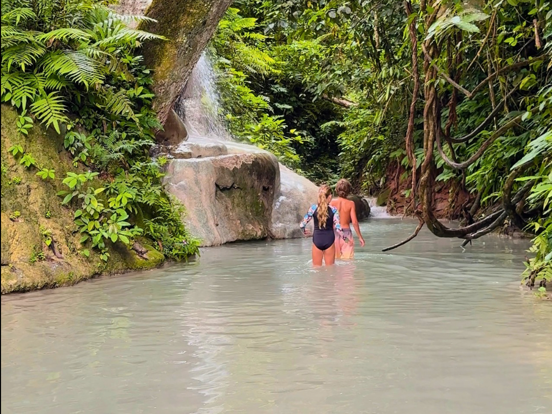 Sticky Waterfall Chiang Mai Thailand natural limestone waterfall where families can climb the rocks and walk through flowing water